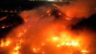 Smoke and flames rise from a wildfire in Andong, South Korea
Pic: Yonhap/Reuters
Pic: Yonhap/Reuters
