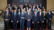 Yvette Cooper poses with participants for a family photo, on the day of the Border Security Summit in London.
Pic: Reuters