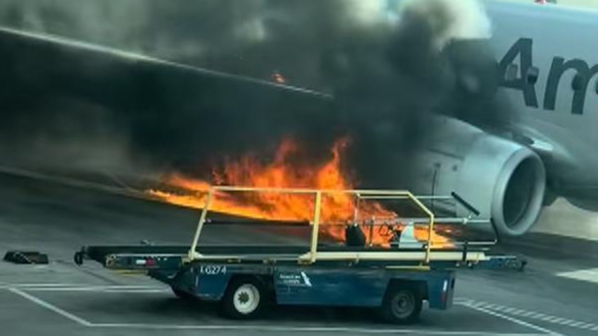 Boeing passenger jet catches fire after engine fault forces American ...