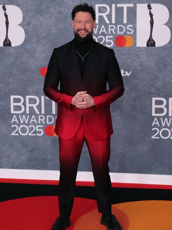 Calum Scott in black and red, plus a turtle neck for good measure. 