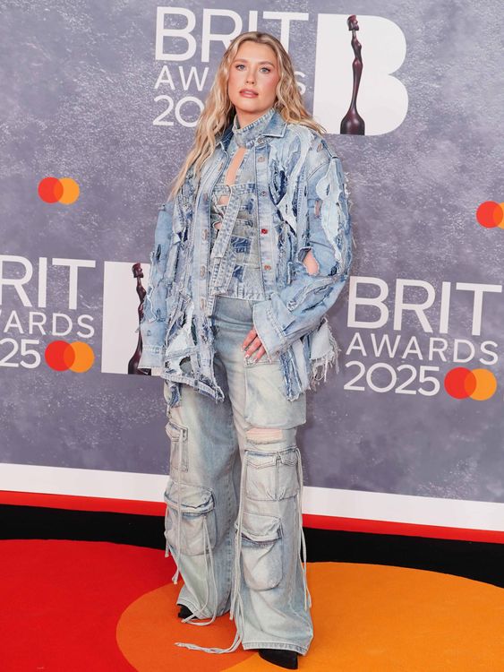 Ella Henderson working the double denim look too. Pic: Reuters