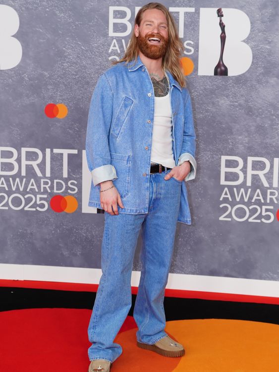 Double denim. If anyone can pull it off, it's Sam Ryder eh?. Pic: PA