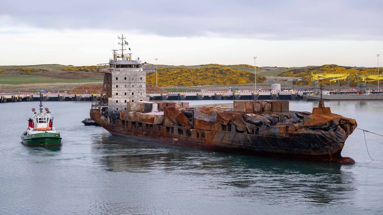 The stricken container ship the Solong, which was involved in a collision with a tanker in the North Sea, is towed in to the port of Aberdeen. The Solong collided with the anchored tanker Stena Immaculate about 12 miles off the coast of East Yorkshire on March 10, leaving one man missing, presumed dead. Picture date: Friday March 28, 2025.
