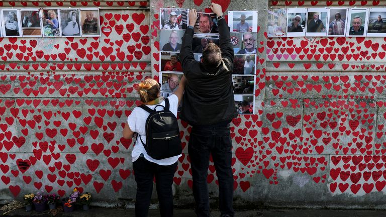 Photos of some of those who died at the memorial represent just over 1% of the total death toll in the UK. Pic: Reuters