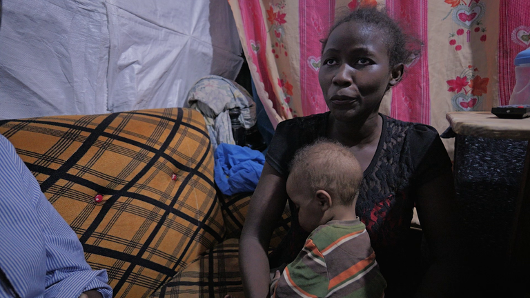 Anne, who is HIV positive, with her young child