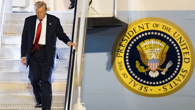 President Donald Trump arrives on Air Force One at Palm Beach International Airport, Friday, March 14, 2025, in West Palm Beach, Fla. (AP Photo/Manuel Balce Ceneta)