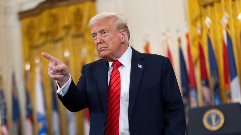 U.S. President Donald Trump gestures during the signing event for an executive order to shut down the Department of Education, in the East Room at the White House in <a href=