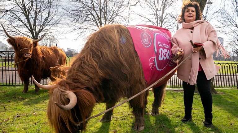 Actress Elaine C Smith grazes Siusan, the Highland cow, on Glasgow Green to mark being given the Freedom of the City of Glasgow. Picture date: Thursday March 6, 2025. PA Photo. See PA story SHOWBIZ Smith. Photo credit should read: Jane Barlow/PA Wire 