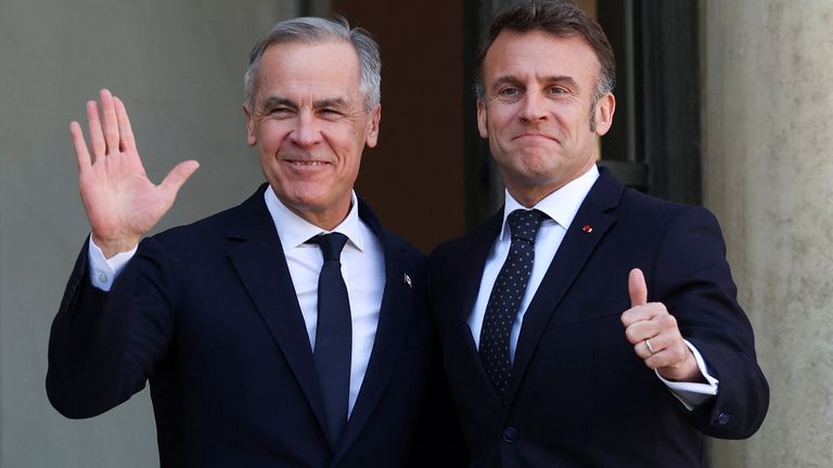 Emmanuel Macron welcomes Canadian Prime Minister Mark Carney at the Elysee Palace in Paris