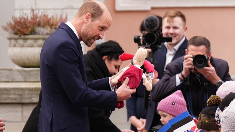 The Prince of Wales meeting children outside the Presidential Office in Tallinn, on the first day of his visit to Estonia.  