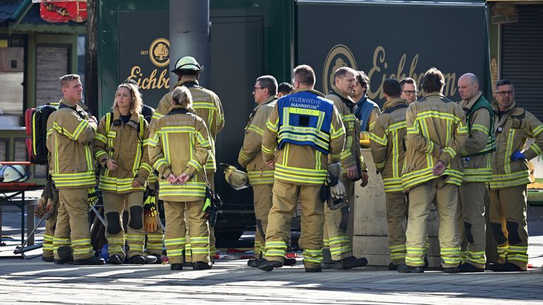 Emergency workers are held during a major operation in the city center of Mannheim, Germany. Pic: DPA / AP