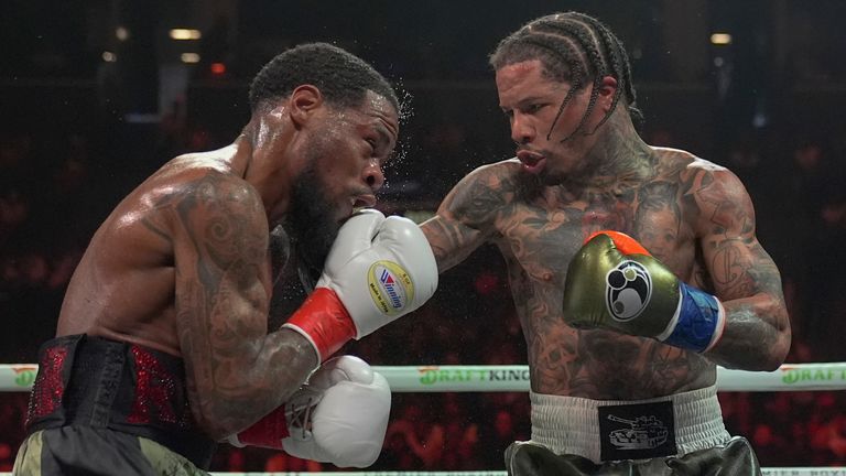 Gervonta Davis, right, punches Lamont Roach in New York. Pic: AP
