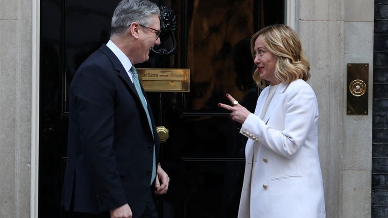 Sir Keir Starmer greets Giorgia Meloni in Downing Street. Pic: Reuters