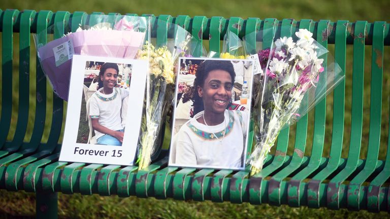 Flowers and pictures left at a vigil on Danes Drive Park in Glasgow for Eritrean refugee Amen Teklay, 15, who died from fatal injuries on Clarendon Street, Glasgow, at around 10.30pm on Wednesday. Police and paramedics rushed to the scene near St George's Cross, but the schoolboy could not be saved. Picture date: Sunday March 9, 2025.