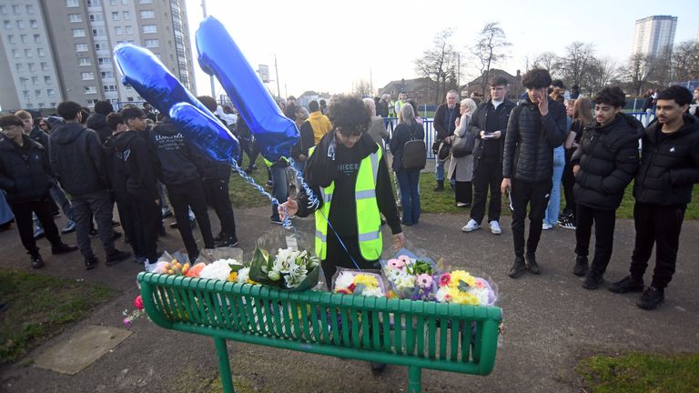 People attend a vigil on Danes Drive Park in Glasgow for Eritrean refugee Amen Teklay, 15, who died from fatal injuries on Clarendon Street, Glasgow, at around 10.30pm on Wednesday. Police and paramedics rushed to the scene near St George's Cross, but the schoolboy could not be saved. Picture date: Sunday March 9, 2025.