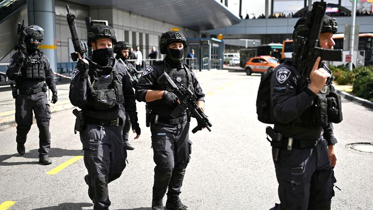 Israeli police guard the area where a suspected stabbing attack took place in Haifa, Israel.
Pic: Reuters