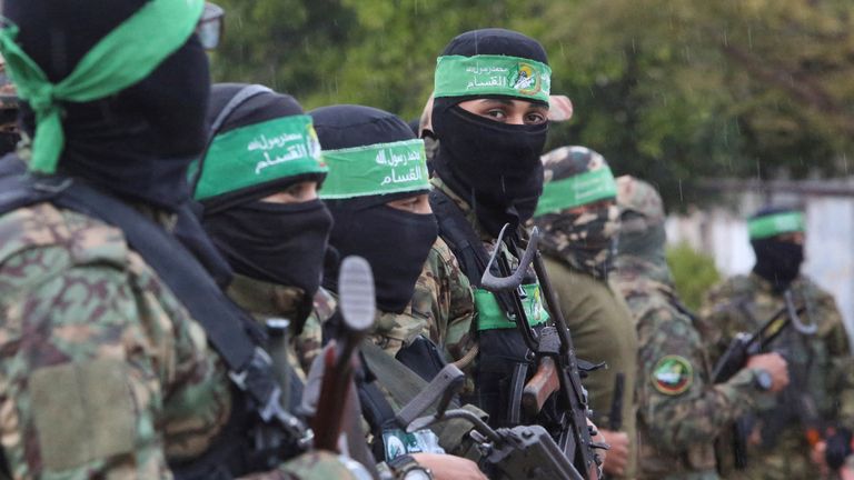 Hamas militants on the day of a hostage handover in Gaza. Pic: Reuters