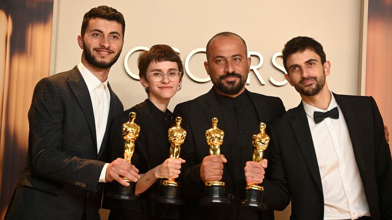 Hamdan Ballal with fellow No Other Land filmmakers after their Academy Award success. Pic: AP