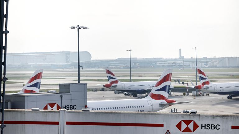 Airplanes remain parked on the tarmac at Heathrow International Airport.
Pic: Reuters