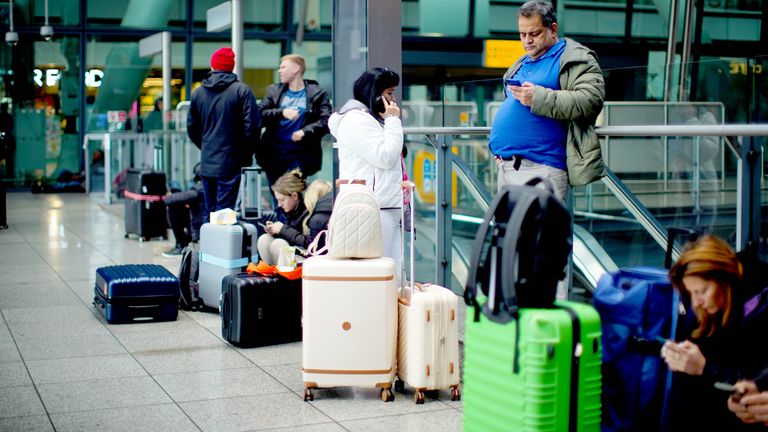 Stranded passengers at Heathrow Terminal 5.
Pic: PA