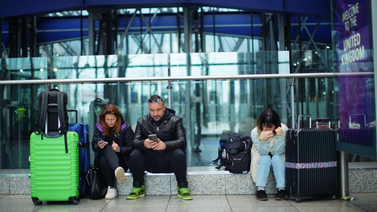                 Stranded passengers at Heathrow Terminal 5 in London. More than 1,300 flights to and from Heathrow Airport will be disrupted on Friday due to the closure of the airport following a fire at the North Hyde electrical substation last night. Picture date: Friday March 21, 2025.
               