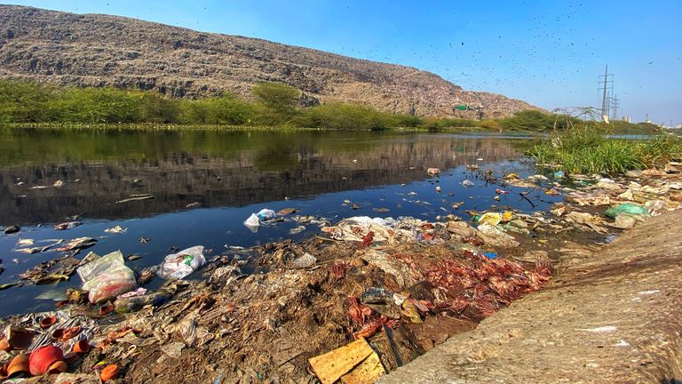 The canal beside the waste mountain