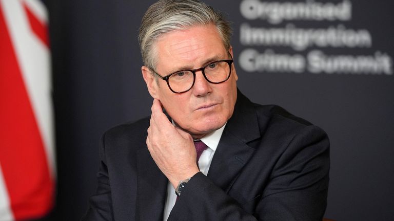 Keir Starmer leads a roundtable discussion at the Border Security Summit.
Pic: Reuters