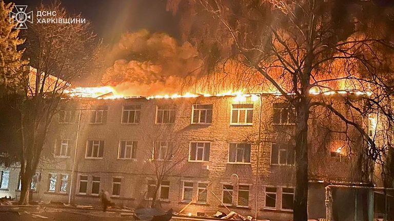 In this photo provided by the Ukrainian Emergency Service, firefighters put out the fire at a civilian hospital following a Russian drone attack in Zolochiv, Kharkiv region, Ukraine, Friday, March 14, 2025. (Ukrainian Emergency Service via AP)