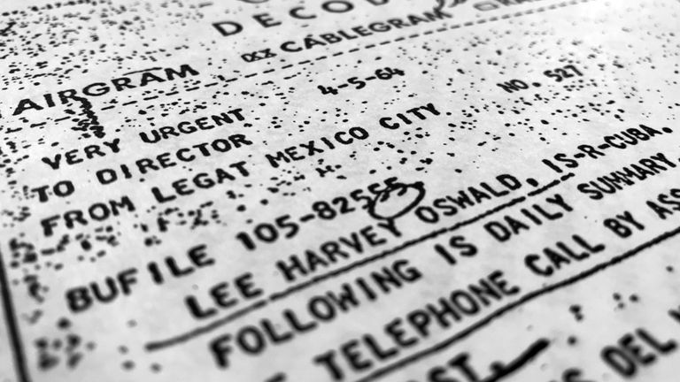 FILE - Part of a file, dated April 5, 1964, details efforts to trace Lee Harvey Oswald's travel from Mexico City back to the United States, is photographed in Washington, Oct. 26, 2017. (AP Photo/Jon Elswick, File)