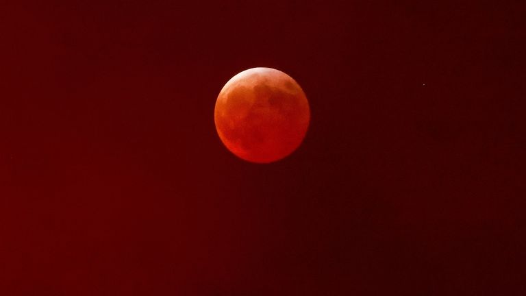 A full moon is seen during a "Blood Moon" lunar eclipse from Ciudad Juarez, Mexico, March 13, 2025. REUTERS/Jose Luis Gonzalez