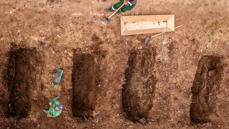 Graves for the victims of a massive nightclub fire are dug with excavators in a cemetery in the town of Kocani, North Macedonia.
Pic: AP