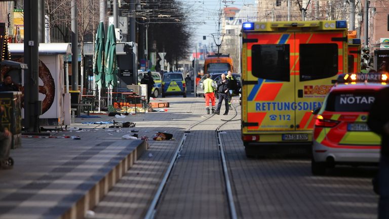 Emergency services and police in Mannheim following a serious incident.
Pic: DPAA/AP