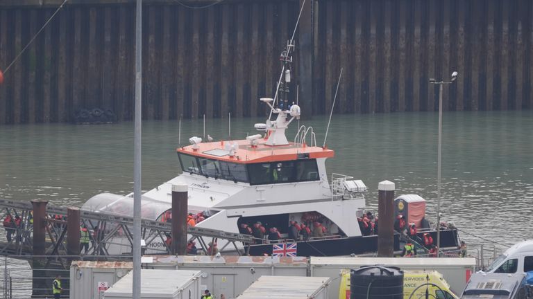 A group of people who are believed to be migrants at the Border Force connection in Dover, to a small boat incident in the channel. Photo: Dad