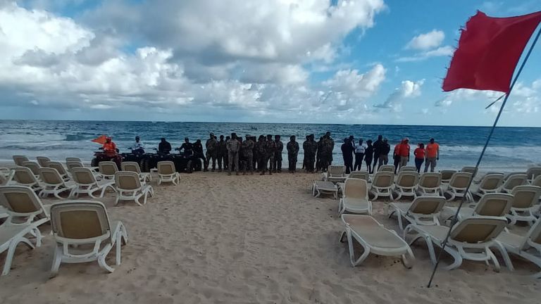 Some of the search team searching the beach where Ms Konanki was last seen.
Pic: Defensa civil