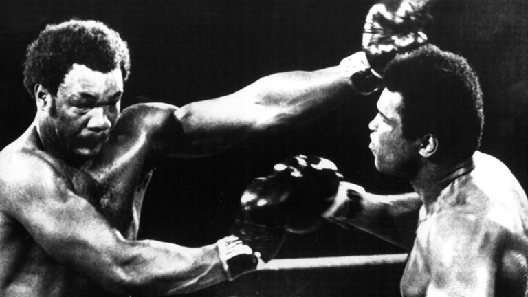 Muhammad Ali (right) George Foreman out in the famous Rumble in the Jungle Fight in 1974. Photo by: DPA/Picture-Alliance/DPA/AP Images