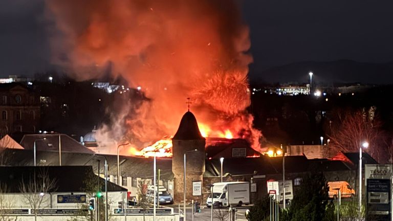 Police are keeping an open mind whether this storage warehouse fire in Musselburgh is linked to a gang feud in Edinburgh. Pic: Iona Paton