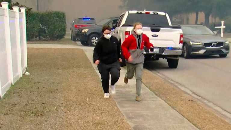 People flee an area in Myrtle Beach. Pic: AP


People move from an area where crews work to contain a fire in the Carolina Forest area west of the coastal resort city of Myrtle Beach, S.C., Sunday, March 2, 2025, where residents were ordered to evacuate several neighborhoods. (WMBF-TV via AP)