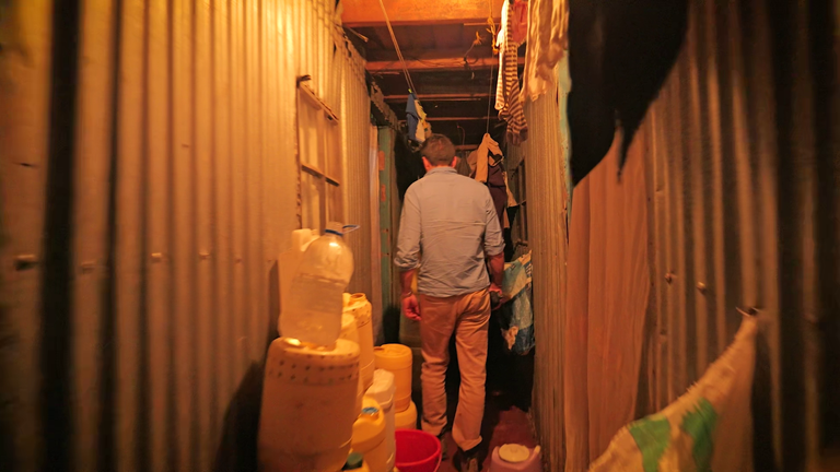 An alleyway of one-room homes in Nairobi