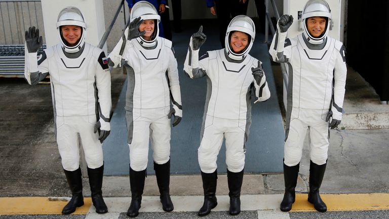 NASA's SpaceX Crew-10 crew members Cosmonaut Mission Specialist Kirill Peskov of Roscosmos of Russia, Pilot Nichole Ayers and Commander Anne McClain of U.S., and Mission Specialist Takuya Onishi of Japan's JAXA, walk from the Operations & Checkout Building at the Kennedy Space Center for transport to Launch Complex 39-A ahead of their launch to the International Space Station in Cape Canaveral, Florida, U.S., March 14, 2025. REUTERS/Joe Skipper