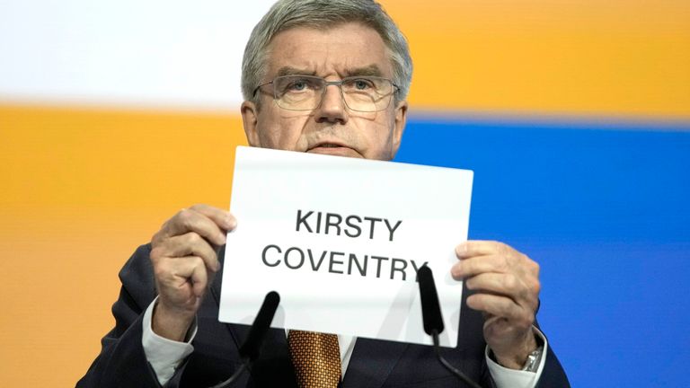 IOC President Thomas Bach holds up the name of Kirsty Coventry as she is announced as the new IOC President.
Pic: AP
