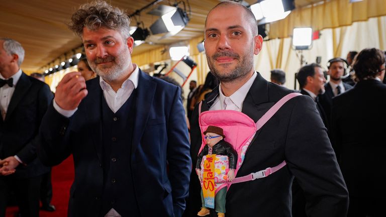 Brecht Van Elslande and Nicolas Keppens pose on the red carpet during the Oscars arrivals at the 97th Academy Awards in Hollywood, Los Angeles, California, U.S., March 2, 2025. REUTERS/Mike Blake