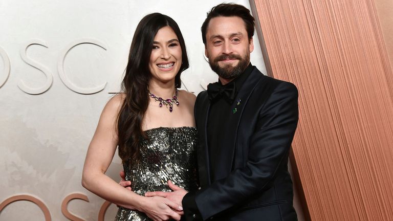 Jazz Charton, left, and Kieran Culkin arrive at the Oscars on Sunday, March 2, 2025, at the Dolby Theatre in Los Angeles. (Photo by Richard Shotwell/Invision/AP)