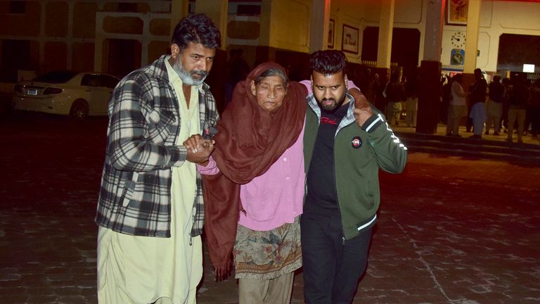 Passengers rescued by security forces from a passenger train attacked by insurgents arrive at a railway station in Quetta, Pakistan, Wednesday, March 12, 2025. (AP Photo/Arshad Butt)