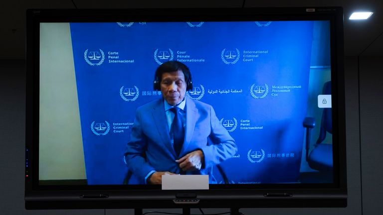 Former Philippine President Rodrigo Duterte is seen on a screen in the courtroom of the International Criminal Court (ICC) in The Hague, Netherlands, Friday, March 14, 2025. (AP Photo/Peter Dejong, Pool)