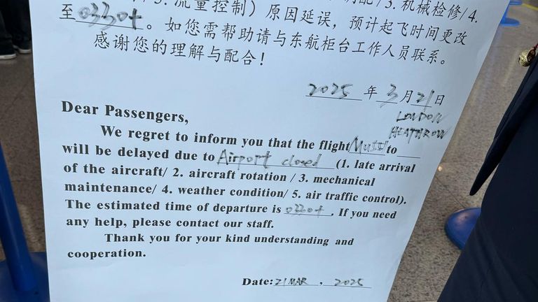 A sign at Shanghai airport informing passengers of the delay. Pic: Sohan Shah