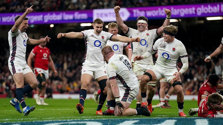 England celebrate their eight try. Pic. PA