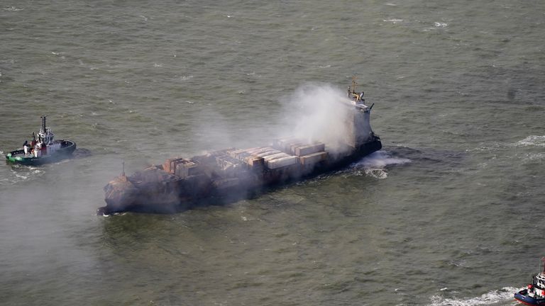 Tug boats shadow the Solong container ship as it drifts in the Humber Estuary, off the coast of East Yorkshire following a collision with the MV Stena Immaculate oil tanker, operating as part of the US government's Tanker Security Programme, on Monday. Picture date: Tuesday March 11, 2025. Danny Lawson/PA Wire