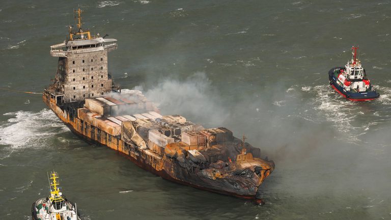 Smoke billows from the MV Solong cargo ship in the North Sea, off the Yorkshire coast, Tuesday, March 11, 2025, in England. (Dan Kitwood/Pool Photo via AP)