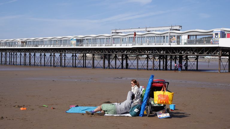People enjoy the warm weather in Weston-super-Mare in Somerset. Pic: PA