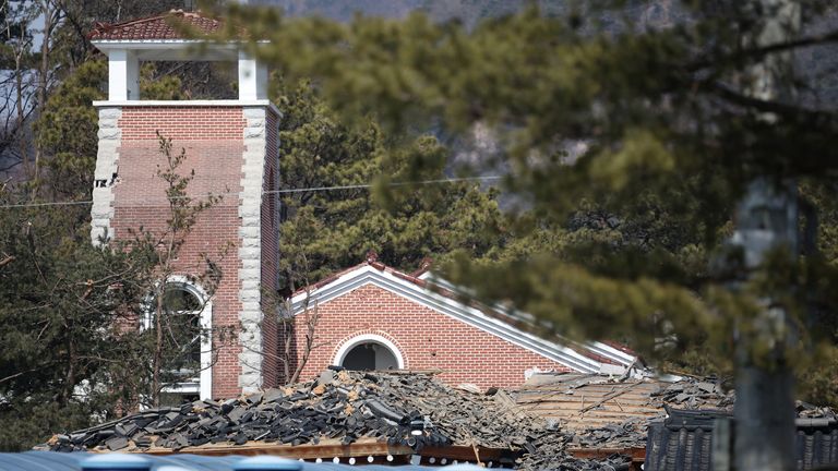 Debris on a damaged church in Pocheon. Pic: Reuters